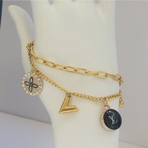 Louis Vuitton zipper pull on unbranded charm bracelet New